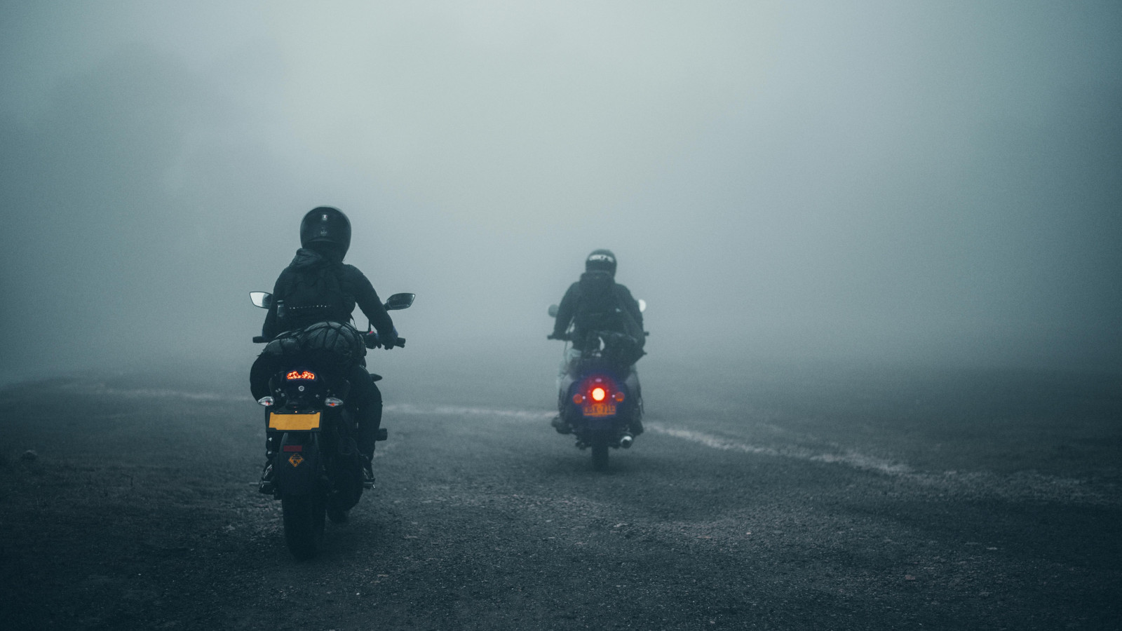 motorcycle riding in foggy weather