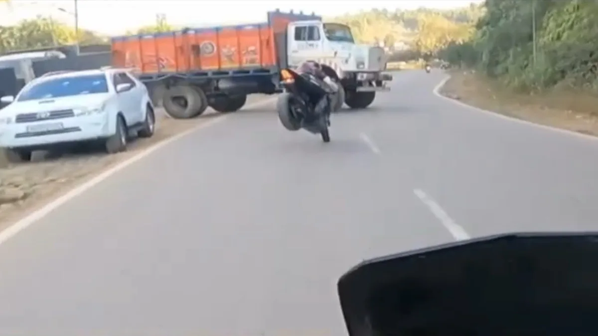 Biker Collides with Truck